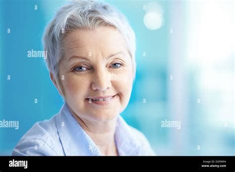 Portrait Of Mature Woman Looking At Camera Stock Photo Alamy