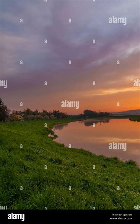 Morava River With Color Sunrise Near Kvasice Village In Central Moravia