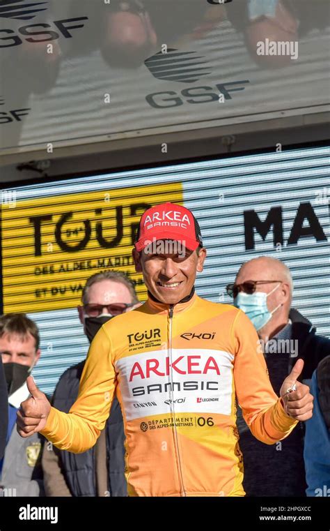 Nairo Quintana Seen On The Podium Wearing The Yellow Winner Jersey With