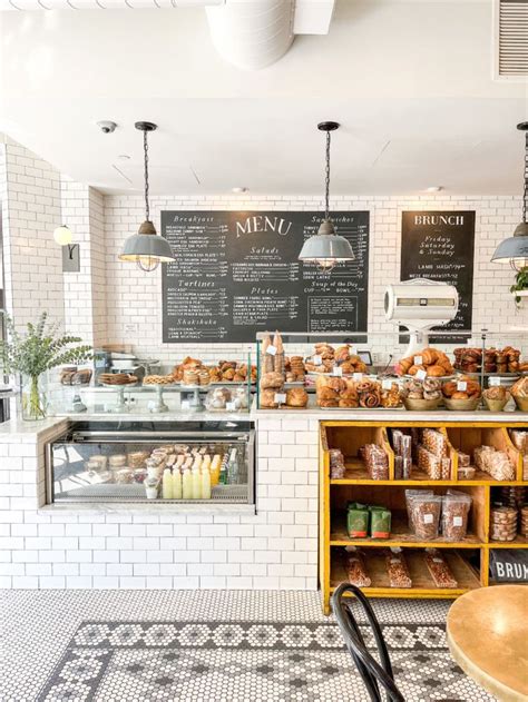 The Inside Of A Bakery With Lots Of Food