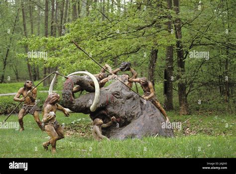 Prehistory,Neanderthal man hunt mammoth Stock Photo - Alamy