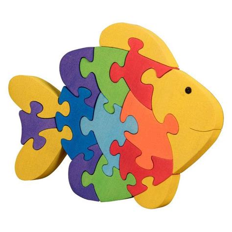 Colorful Wooden Fish Puzzle Pieces On White Background