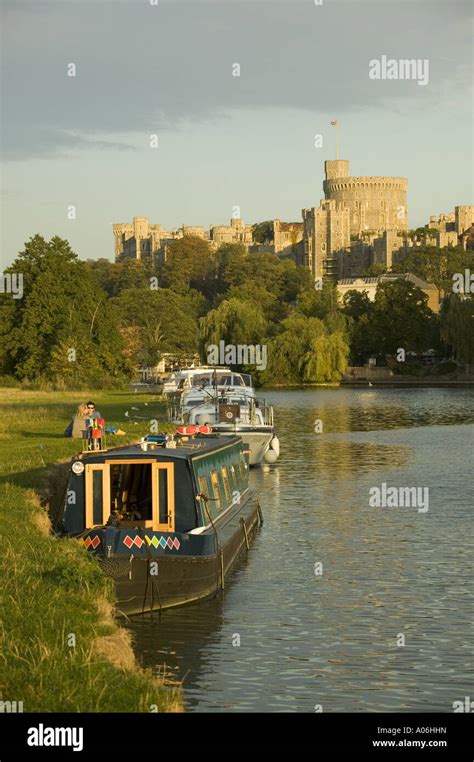 River Thames And Narrow Boat With Main Turret Of Windsor Castle In