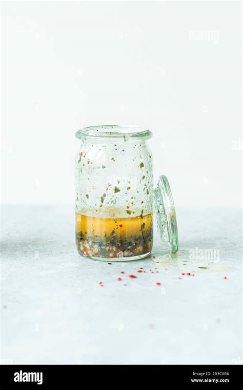 Homemade Italian Vinaigrette Salad Dressing In A Small Glass Pitcher