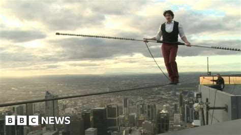 Tightrope Walker Crosses Melbourne Skyline Bbc News