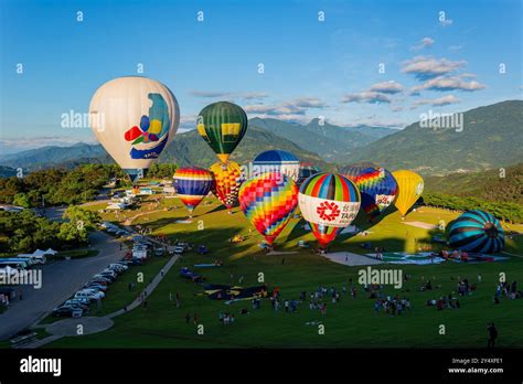 Taitung JUN 21 2014 Sunrise Landscape With The Hot Air Balloon Festival At The Luye Highlands