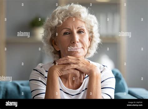 Headshot Portrait Mature Woman Posing Looking At Camera Stock Photo Alamy