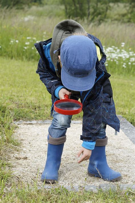 Hd Wallpaper Child Wearing Blue Jacket Hat And Boots Holding