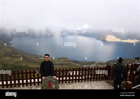 Antu 14th June 2019 A Tourist Poses For Photos At Tianchi Lake On