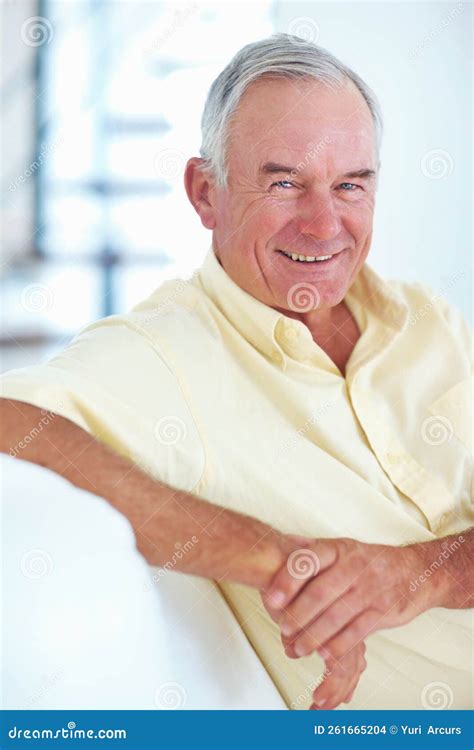 Cheerful Mature Man Smiling At Home Portrait Of Cheerful Mature Man