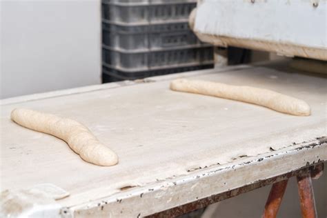 Premium Photo Uncooked Bread Dough Loaves Ready To Bake In Industrial