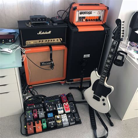 Black Guitar Hanger In Home Music Room Artofit