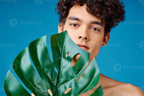 Man With Curly Hair Naked Shoulders Green Leaves Ecology 22332458 Stock