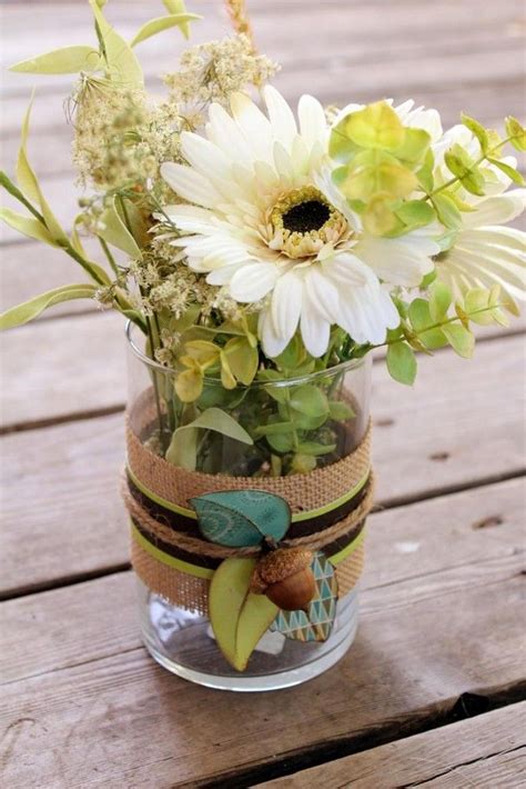 Simple Glass Vase Decorated By Wrapping Ribbon Rope And Flower Detail