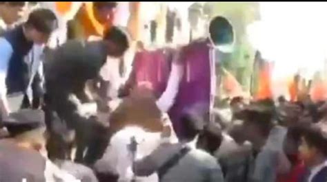 Watch Amit Shah Falls During Madhya Pradesh Roadshow Escapes Unhurt