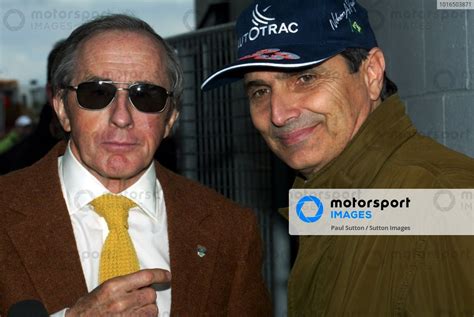 L To R Sir Jackie Stewart Gbr With Fellow Three Time F World