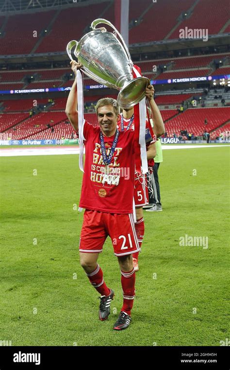 Munichs Philipp Lahm With The Trophy During The Uefa Champions League