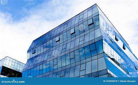 Modern Office Building With Glass Facade On A Sky Background