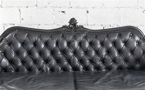 Black leather sofa — Stock Photo © vichie81 #97420752