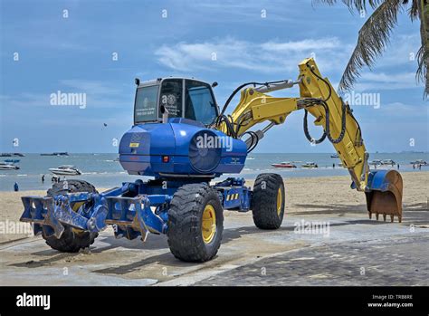 Backhoe Sand Excavator Employed In The Beach Reclamation Project At