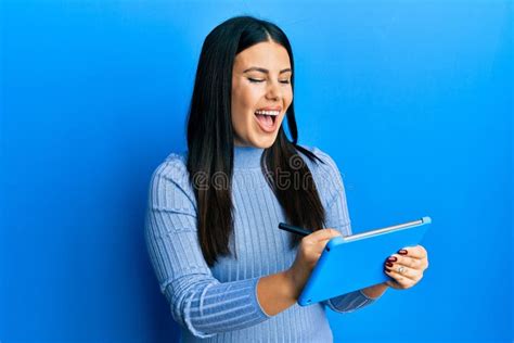 Beautiful Brunette Woman Using Touchpad Drawing On Screen Smiling And