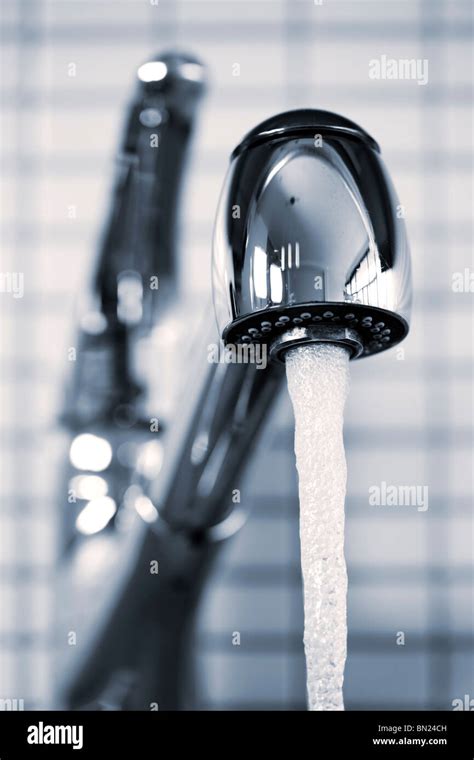 Stainless Steel Kitchen Faucet With Running Water Stock Photo Alamy