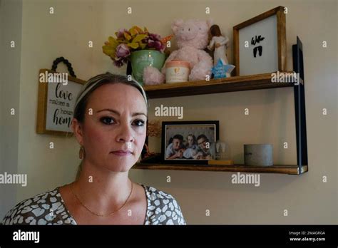 Sarah Halsey A Labor And Delivery Nurse Stands Next To Belongings In