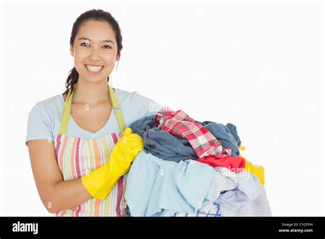 Laughing Woman Holding Laundry Basket Stock Photo Alamy