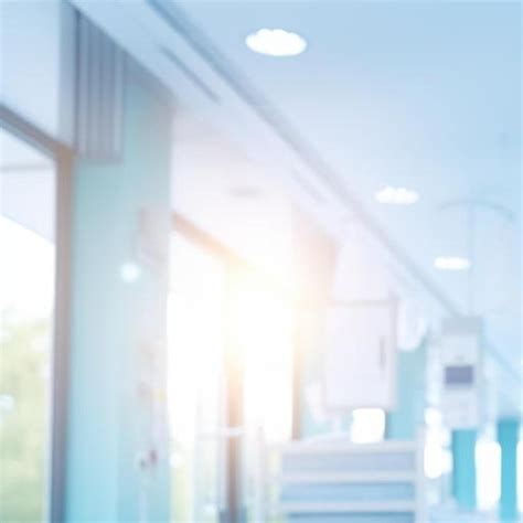 Premium Photo Light And Blue Hospital Blurred Medical Background