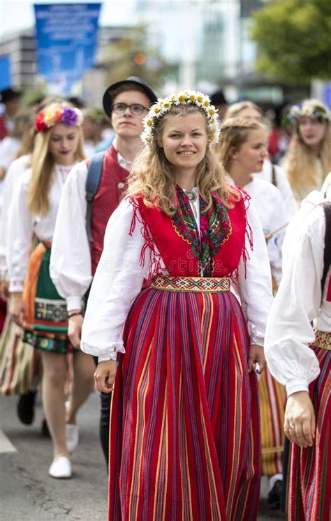 Estonian People in Traditional Clothing Walking the Streets of Tallinn ...