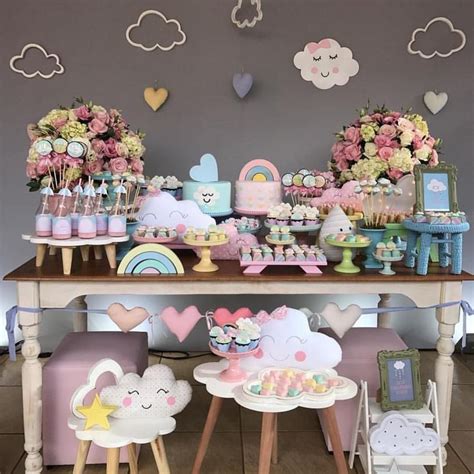 A Table Topped With Lots Of Cake And Cupcakes On Top Of Wooden Tables