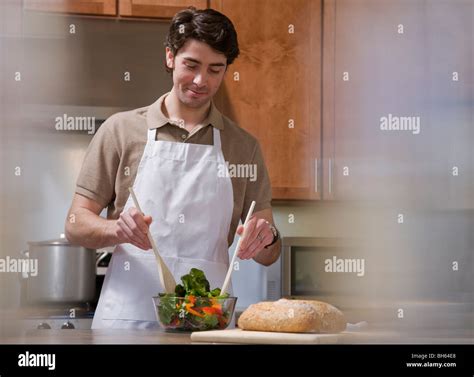 Man Cooking In Kitchen Stock Photo Alamy