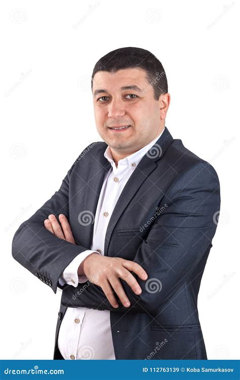 Portrait Of Young Man Dressed In A White Shirt And Black Suit I Stock