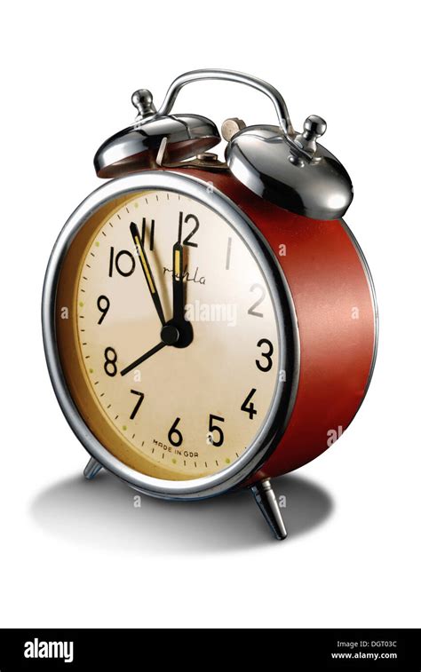 Alarm Clock Showing Five Minutes To Twelve Stock Photo Alamy