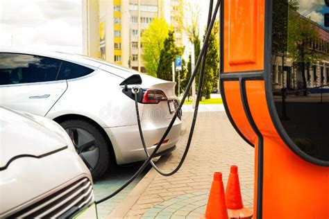 Electric Car At The Charging Station Ecology Stock Image Image Of