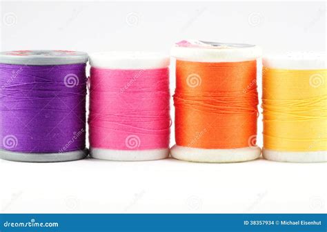 Four Spools Of Colored Thread Stock Photo Image Of Mend Sewing