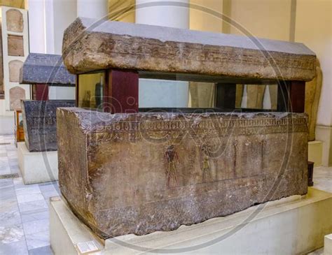 Image Of Ancient Egyptian Sarcophagi And Mummy Caskets Displayed In