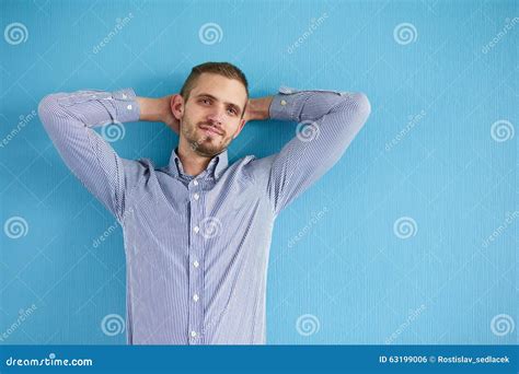 Man Leaning Against A Blue Wall Stock Photo Image Of Portrait Male