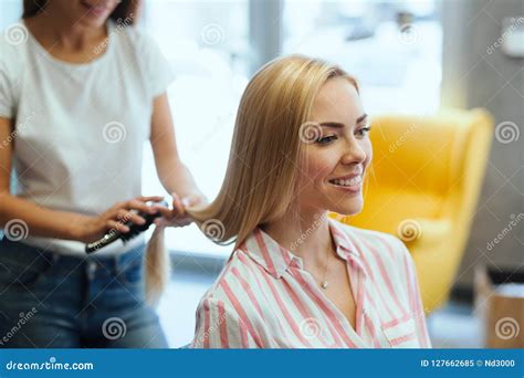 Hairdresser Doing Haircut For Women In Hairdressing Salon Stock Image