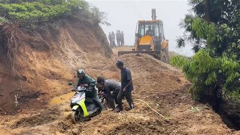 Making Trench And Fixing Road With Ditch Water And Mud After Heavy Rain