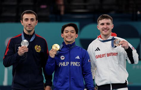 IN PHOTOS Gymnastics Star Carlos Yulo Scoops Historic 2nd Olympic Gold