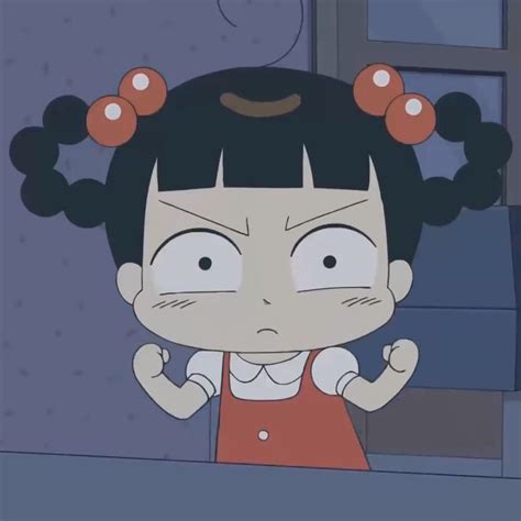 an animated character with black hair and red dress