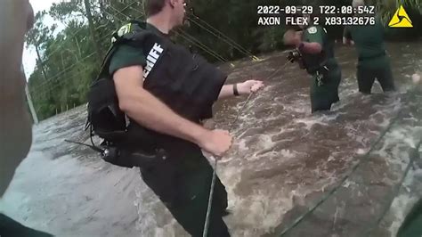 Florida Deputies Form Human Chain To Rescue Woman From Floodwaters