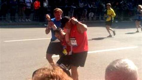 An Awesome Moment Boston Marathoners Carry Runner To The Finish Line