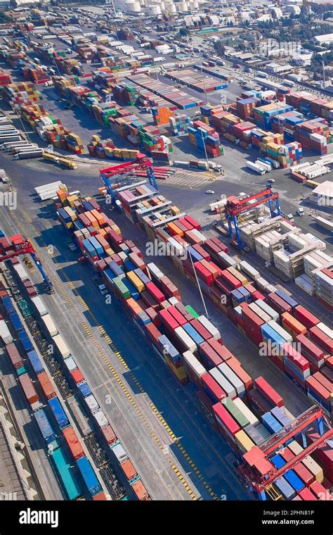 Stacked Cargo Containers Aerial View Containers At Logistics Terminal