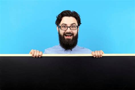 Premium Photo Man Holding Chalk Board