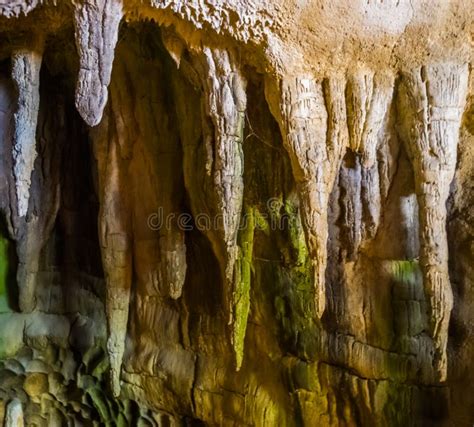 Stalagmite Stones Hanging On The Ceiling Of A Drip Cave Underground