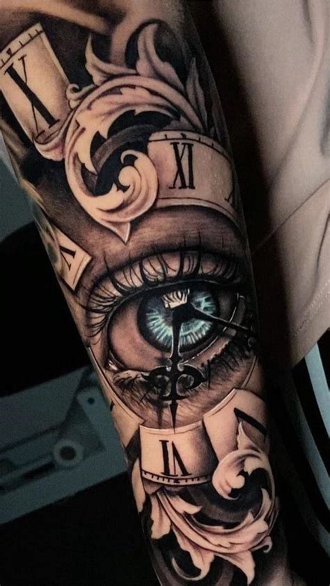 A Person With A Clock And Eye Tattoo On Their Arm