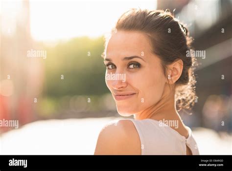 Woman Looking Over Her Shoulder Hi Res Stock Photography And Images Alamy