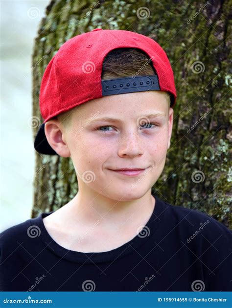 Cap On Backwards With Boyish Smile Stock Image Image Of Grinning